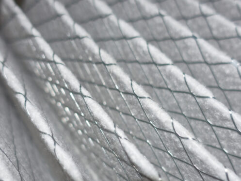 Close up of a white air filter, highlighting the difference between an air purifier and a standard air filter. | High 5 Plumbing, Heating & Cooling